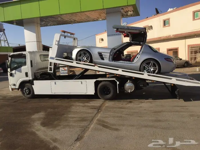 سطحة لنقل السيارات من دبي للسعودية  0