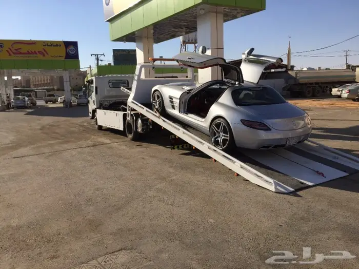 سطحة لنقل السيارات من دبي للسعودية  1