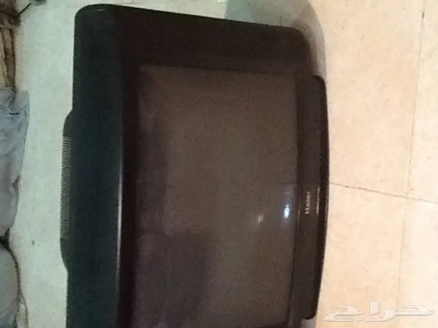 اسطوانة غاز وتلفزيون  وجهاز سير مشي 