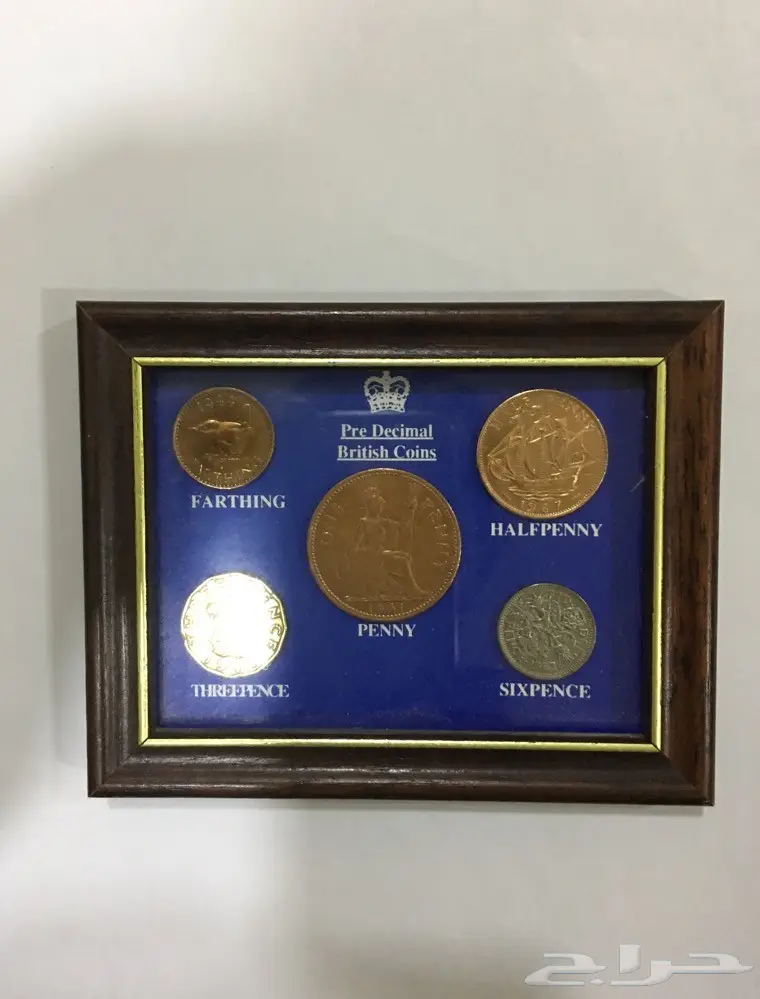 عملات بريطانية قديمة داخل ايطار قديم (image 1)