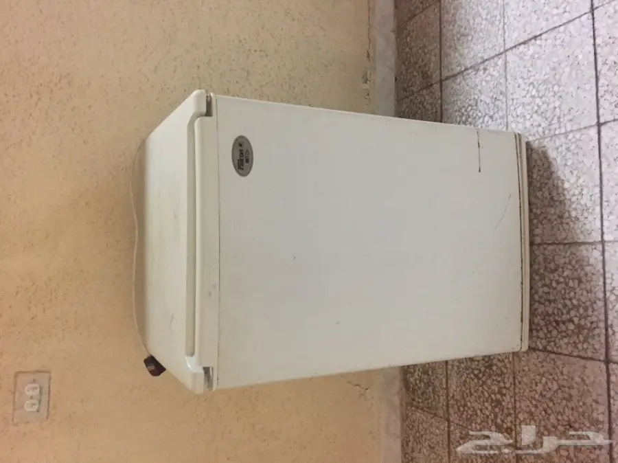 تلفزيون و ثلاجه 