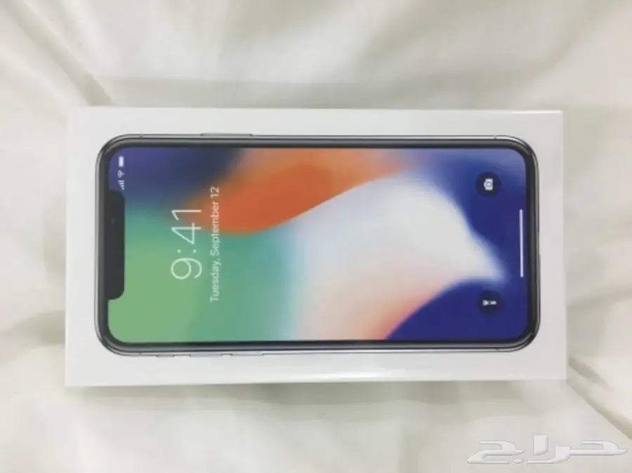 ايفونx  فضي 64 قيقا جديد بتغليف المصنع 