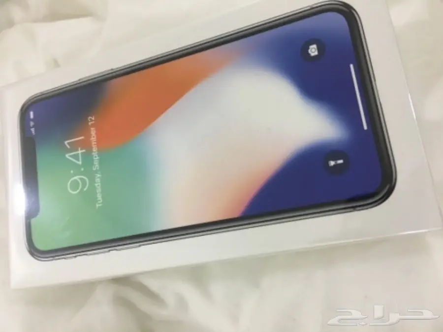 ايفونx  فضي 64 قيقا جديد بتغليف المصنع  (image 1)