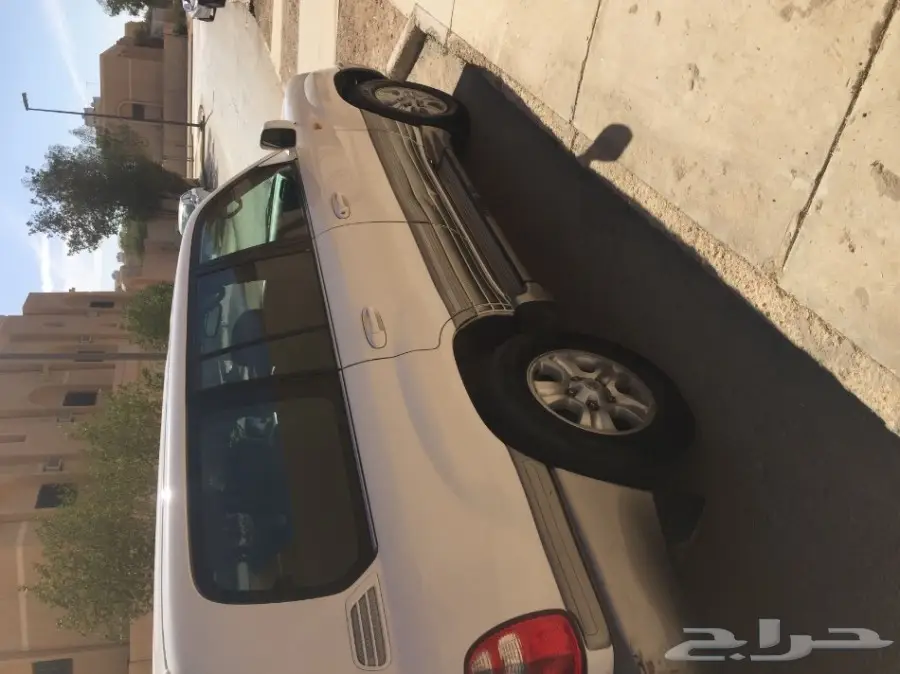 لاند كروزر GXR 2003 اللون ابيض فل كامل