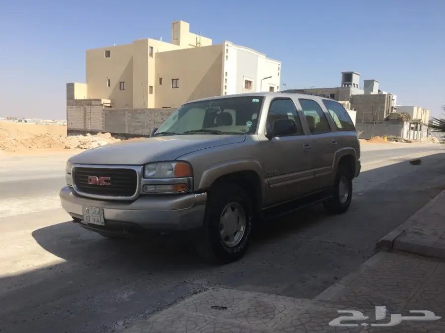 يوكن 2006 ذهبي فضي 