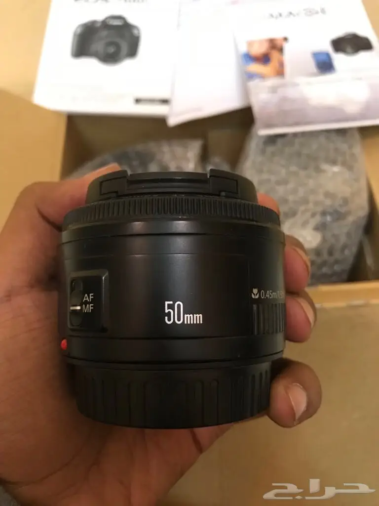 كاميرا كانون d1100 مع عدسة 50 m