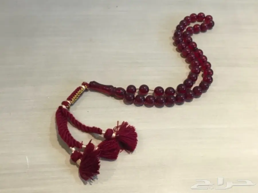 مزاد رقم 300 سبحة تراب كهرمان عنابي