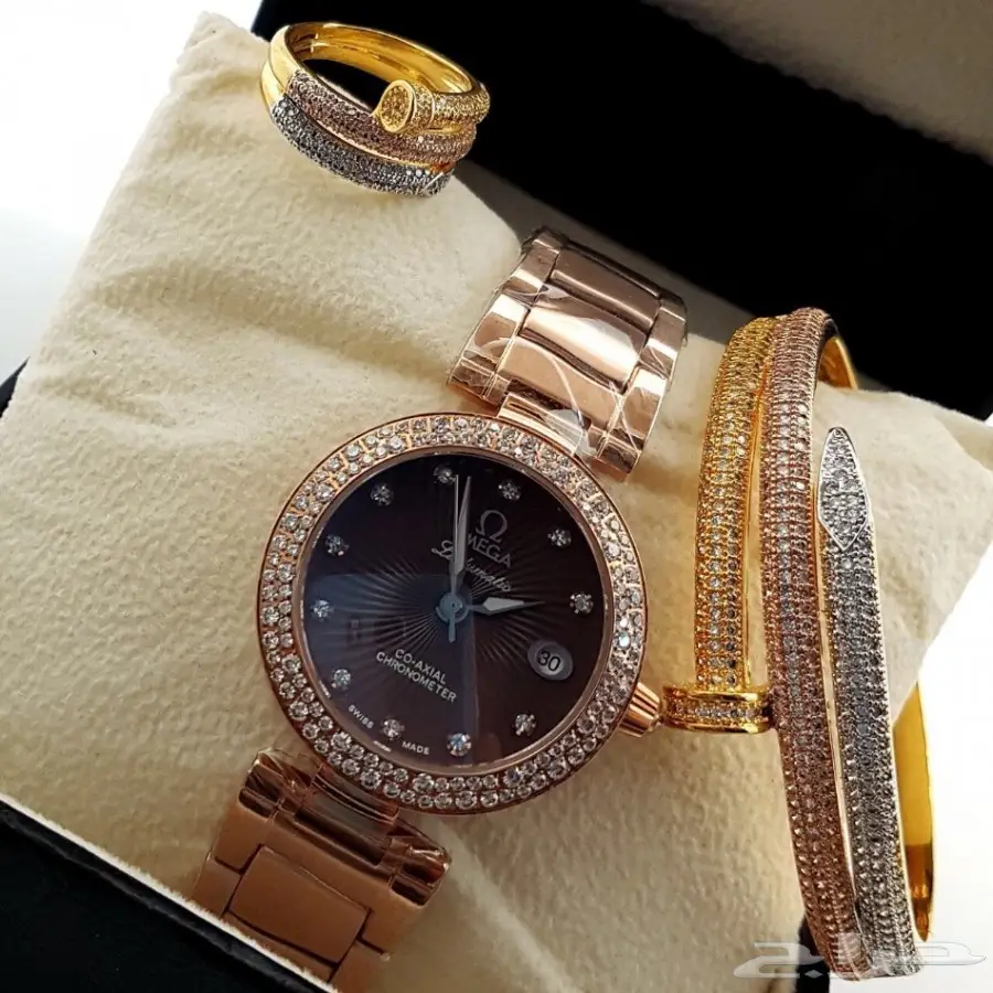 أطقم الماركات العالمية رجالي ونسائي 2018 (image 313)