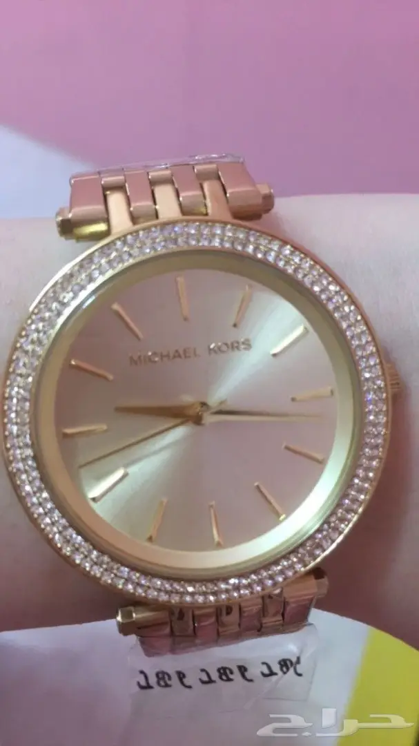 ساعات مايكل كورس