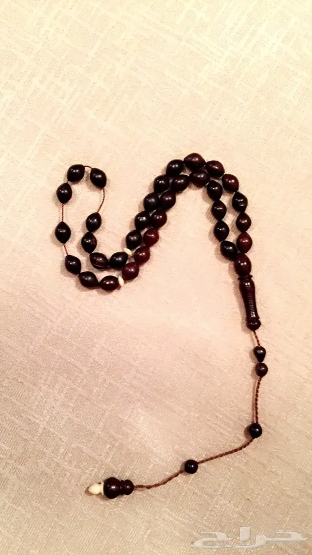 مزاد رقم(76)  لمدة ساعتين سبحة حجر حبات صغير