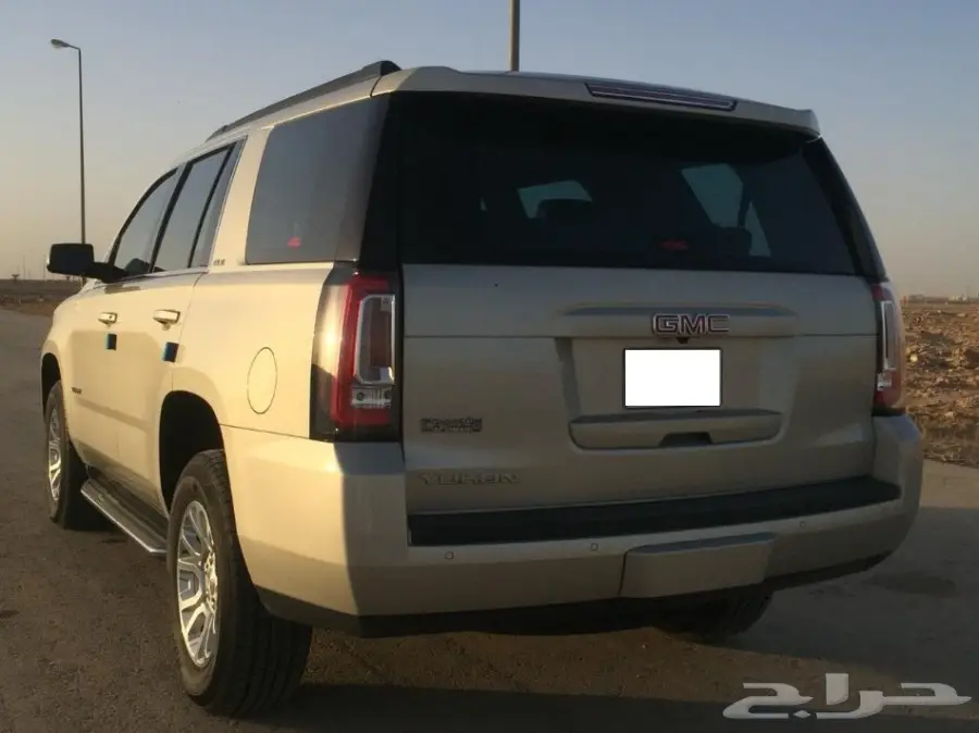 يوكن 2015 SLE دبل قصير ذهبي  (image 2)