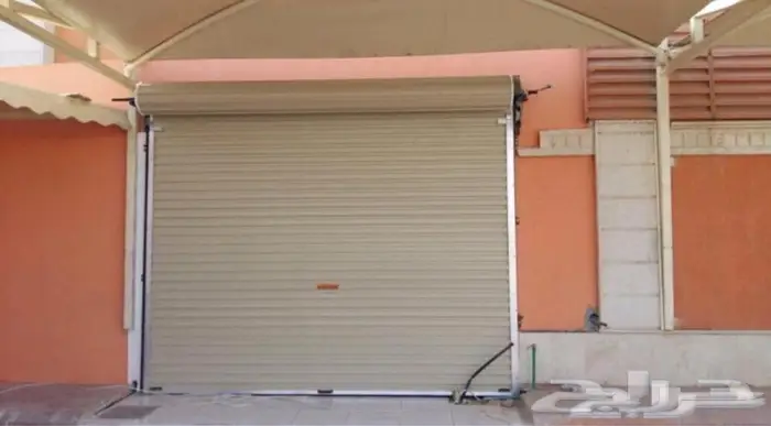 صيانه وتركيب ابواب كراج بايكه تصليح باب قراج اصلاح قراش كهرب 2