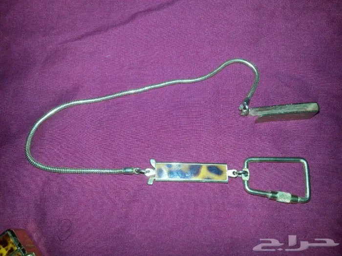 ولاعة و سلسلة مفاتيح ومشبك قديم 3