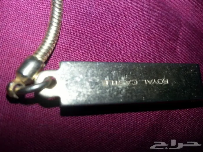 ولاعة و سلسلة مفاتيح ومشبك قديم 6