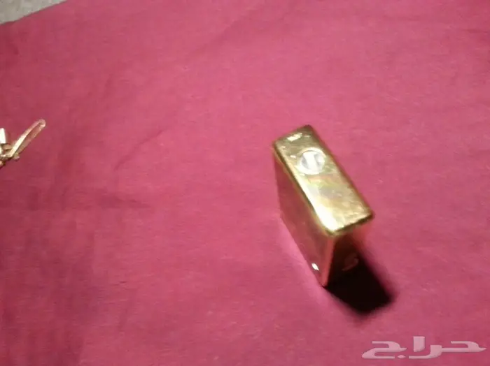 ولاعة و سلسلة مفاتيح ومشبك قديم 11