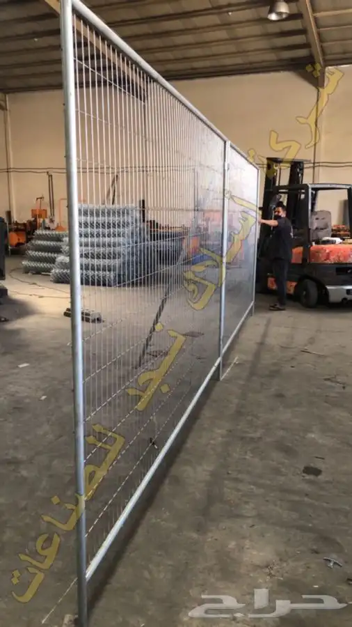 Galvanized welded temporary fence panels set on the plates 5