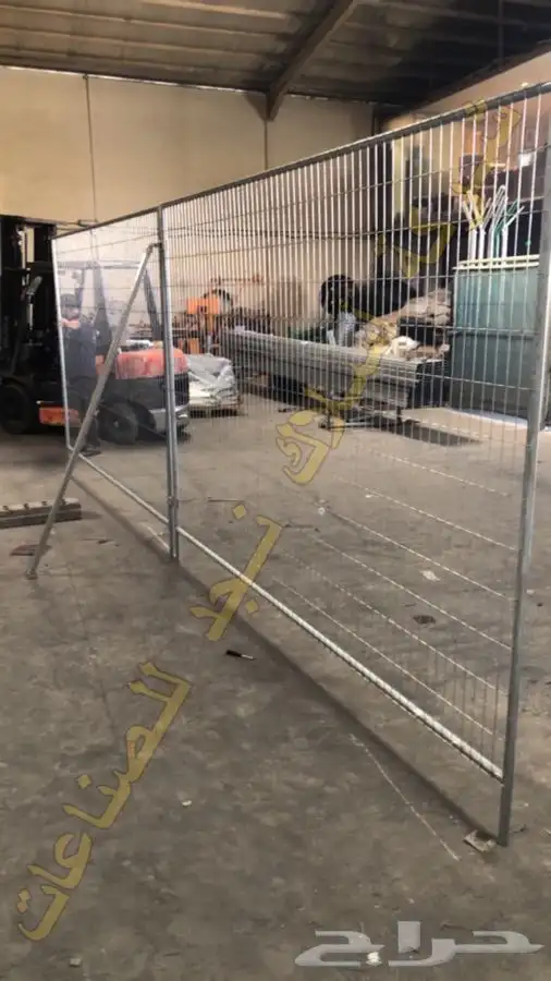 Galvanized welded temporary fence panels set on the plates 6