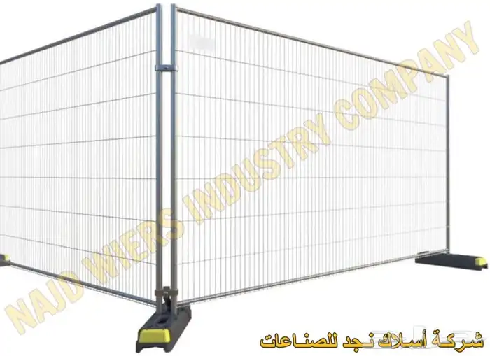 Galvanized welded temporary fence panels set on the plates 0