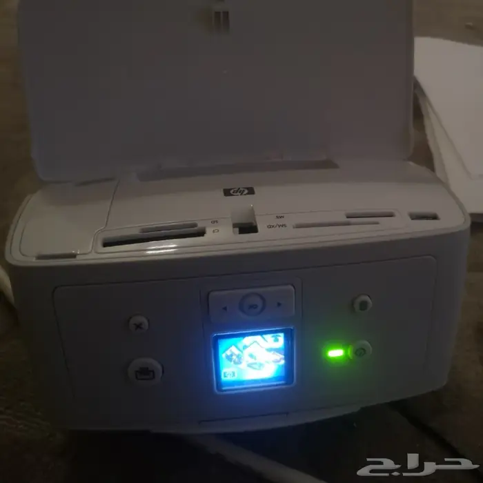 طابعة hpملون صور  كامل اغراضها بالكرتون  1