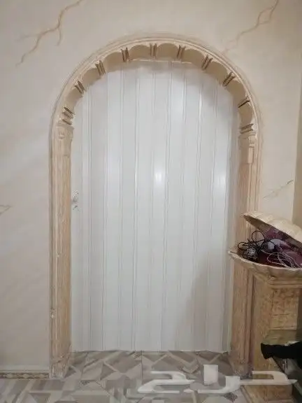 تركيب باب اكروديون على قوس 13