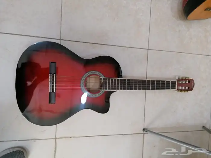 جيتار (قيتار) ياماها وصيني واعواد موسيقية 5