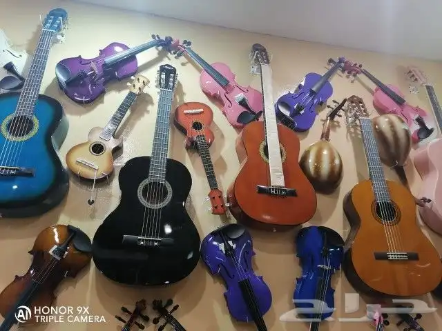 جيتار (قيتار) ياماها وصيني واعواد موسيقية 10