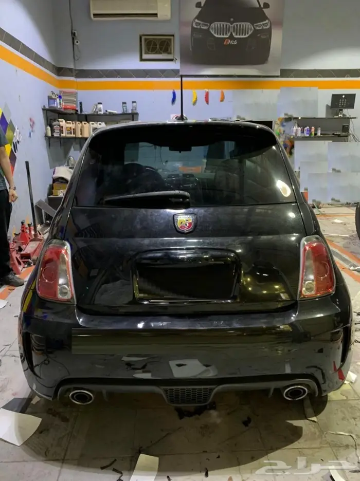 تجليد سقف ونياكل الفيات 500 بالاسود اللماع 5