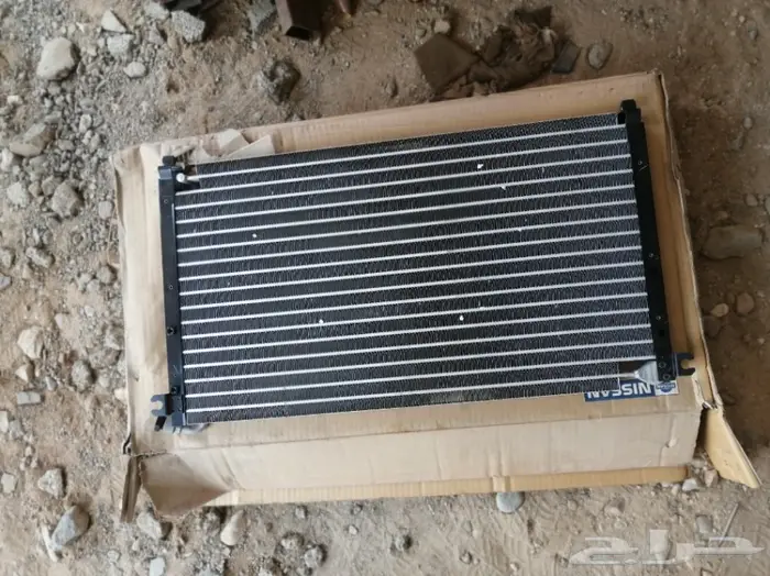 رديتر مكيف ددسن 86-97 اصلي بالكرتون 1