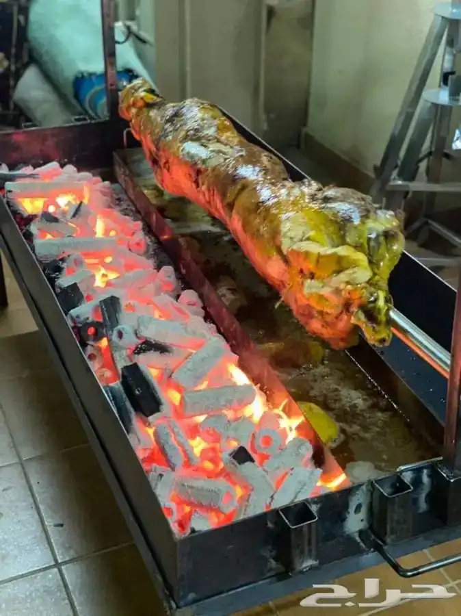 شوي الخروف علي الجمر بموقعك علي السيخ 3