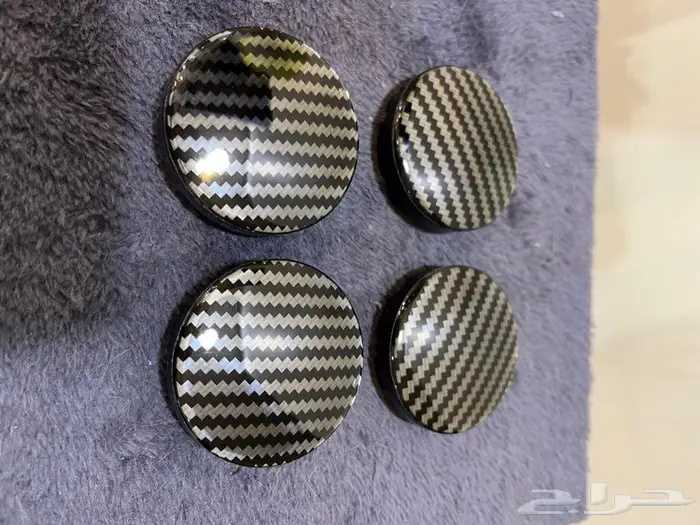 طقم أغطية جنوط مقاس 56 ملم شعار كاربون فايبر 0