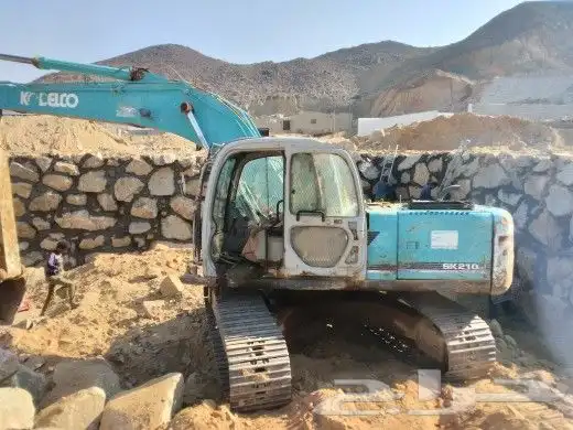 معلم حجر وبوكلين للايجار وتخريم صخور 0