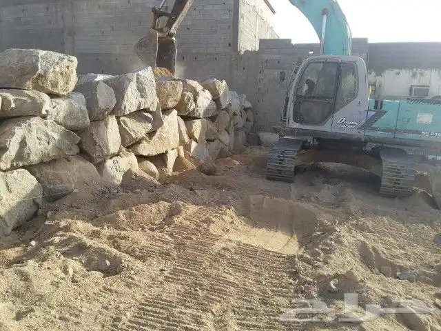 لايجار بوكلين وبناء جدارن الحجر وتفيتيت صخور 1