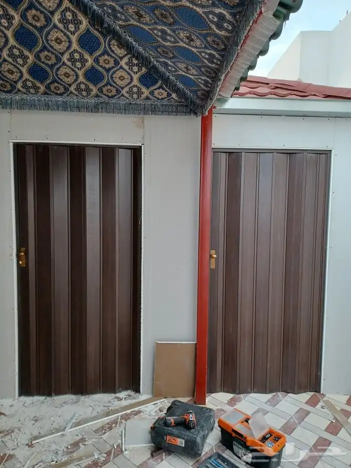 باب اكروديون أبواب سحب باب جلد 1