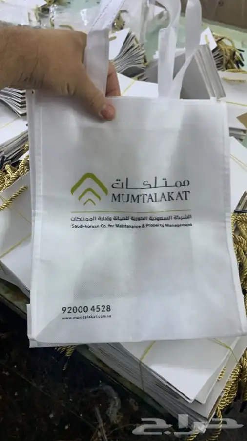 أكياس قماش تاقات عبايات لوقو جلد بوكسات عبايات ليبل قماش 2