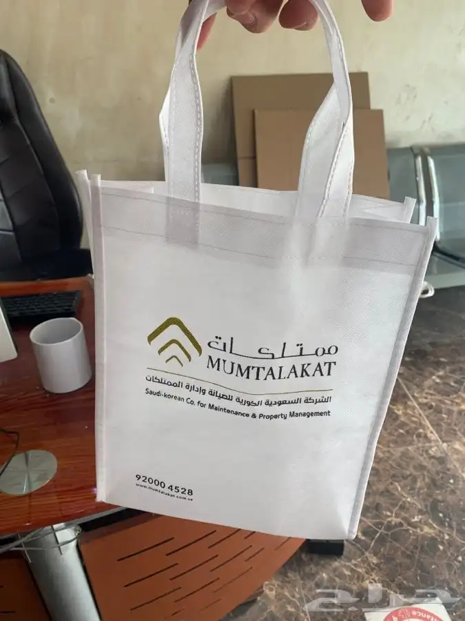 أكياس قماش تاقات عبايات لوقو جلد بوكسات عبايات ليبل قماش 0