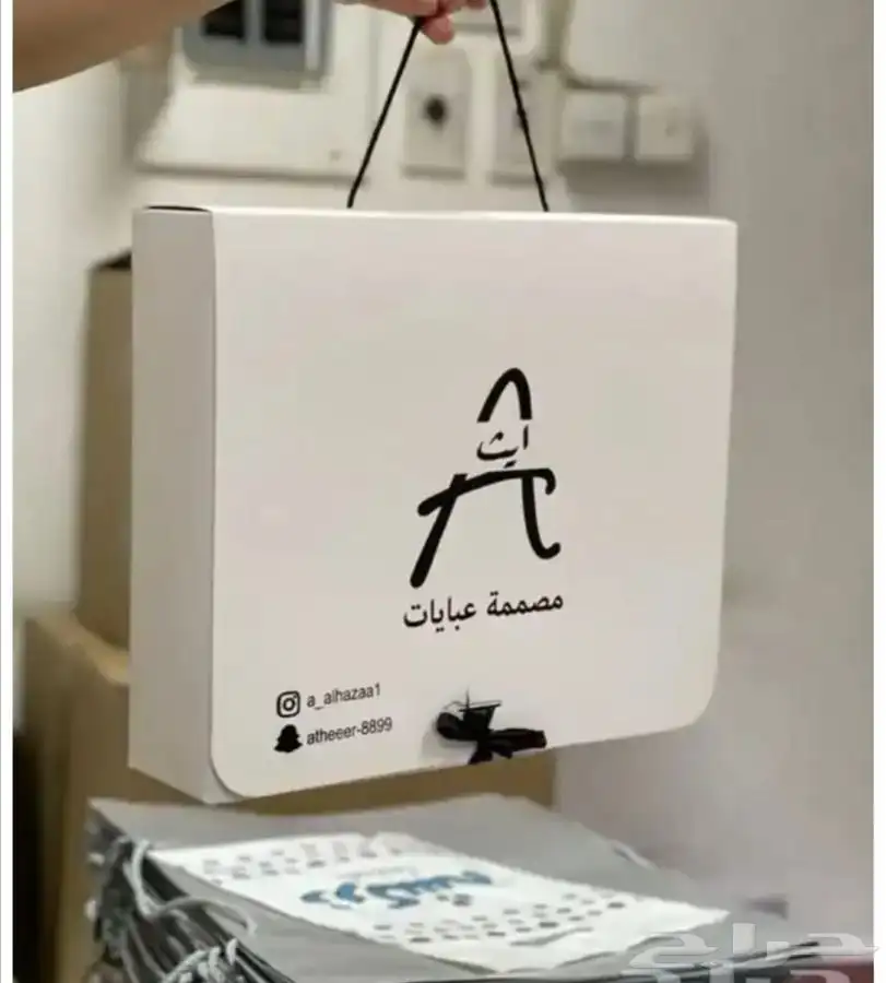 أكياس قماش تاقات عبايات لوقو جلد بوكسات عبايات ليبل قماش 21