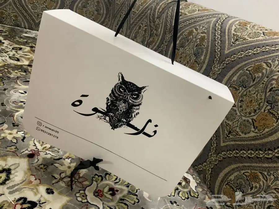 أكياس قماش تاقات عبايات لوقو جلد بوكسات عبايات ليبل قماش 10