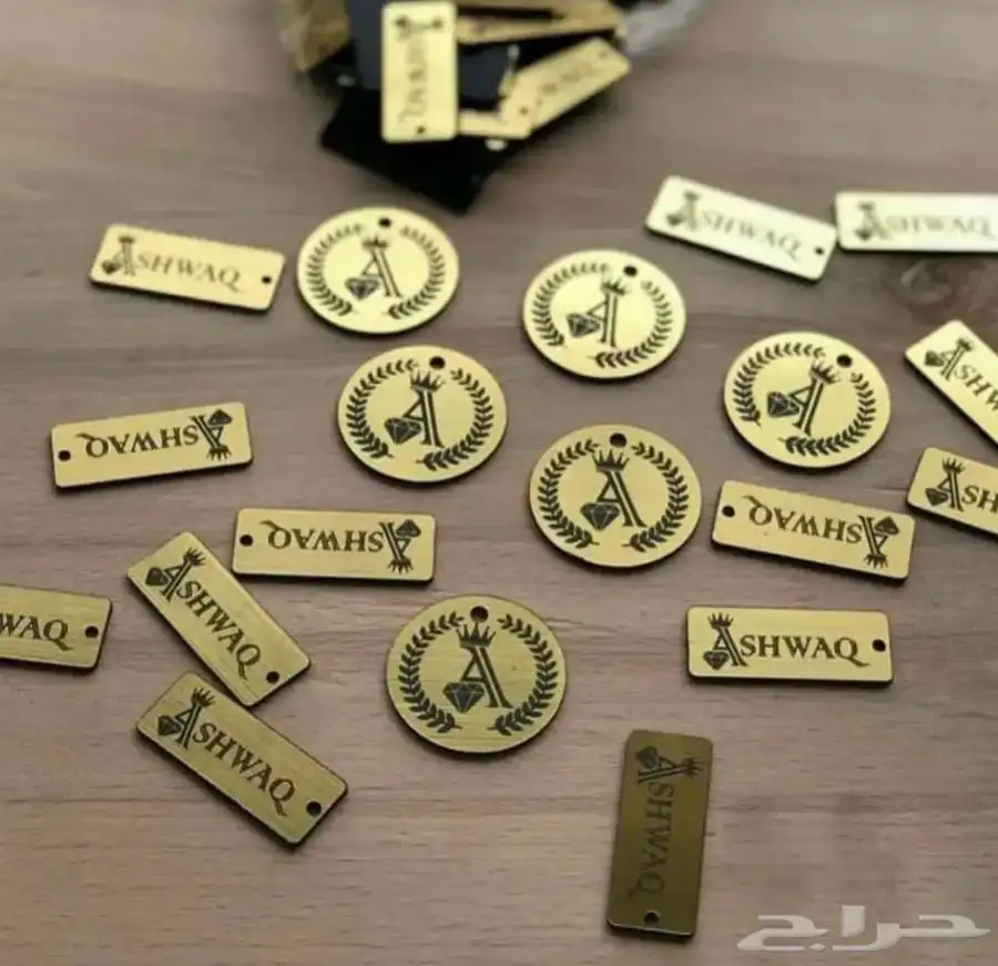 أكياس قماش تاقات عبايات لوقو جلد بوكسات عبايات ليبل قماش 17