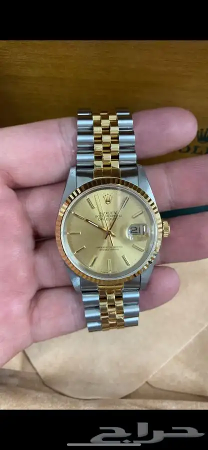 ساعة رولكس أصليه نظيفة مخزنه نص ذهب ونص ستيل قزاز كريستال 1