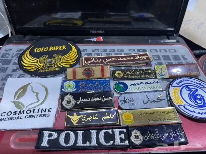 لمسات لزي الموحدطباعه طباعه تطريززيموحدكابات فنايل كشافه حرس 70