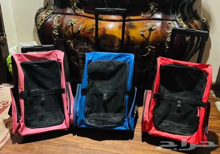 شنط للقطط والكلاب بعجلات جرارة جديده((علي السوم ))) 0