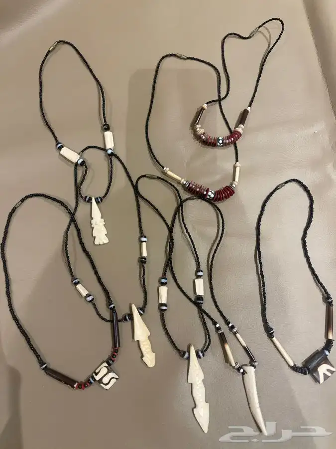 سلاسل يدويه افريقيه واساور الصداقه و ربطات شعر 0