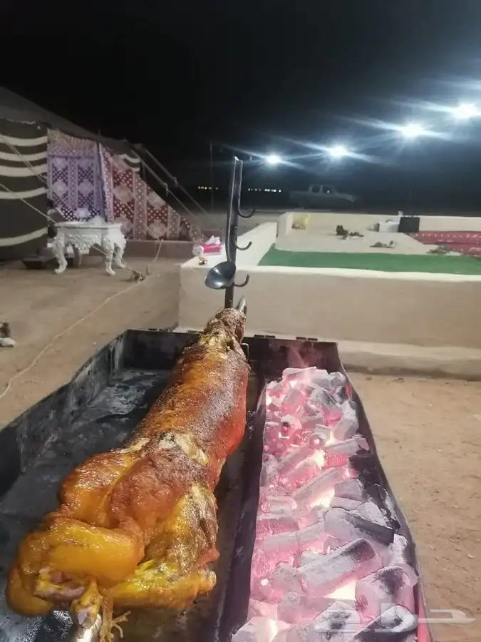 شوي الخروف كامل باالطريقه العثمانيه بموقعك 45