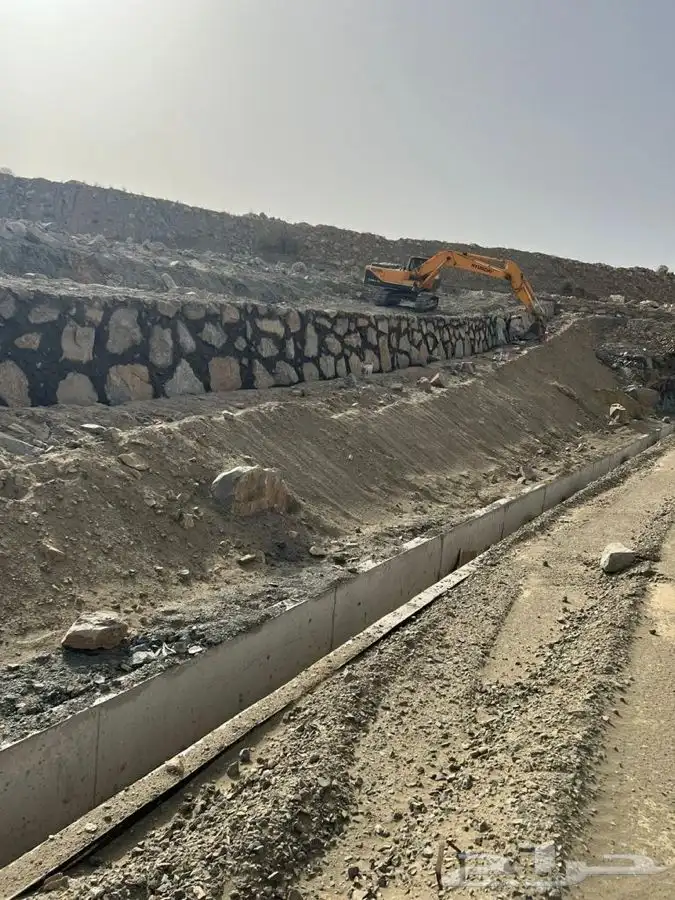 بناء جدار حجر بوكلين ايجار 10