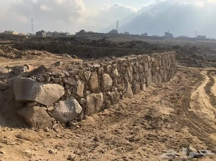 بناء جدار حجر بوكلين ايجار 5