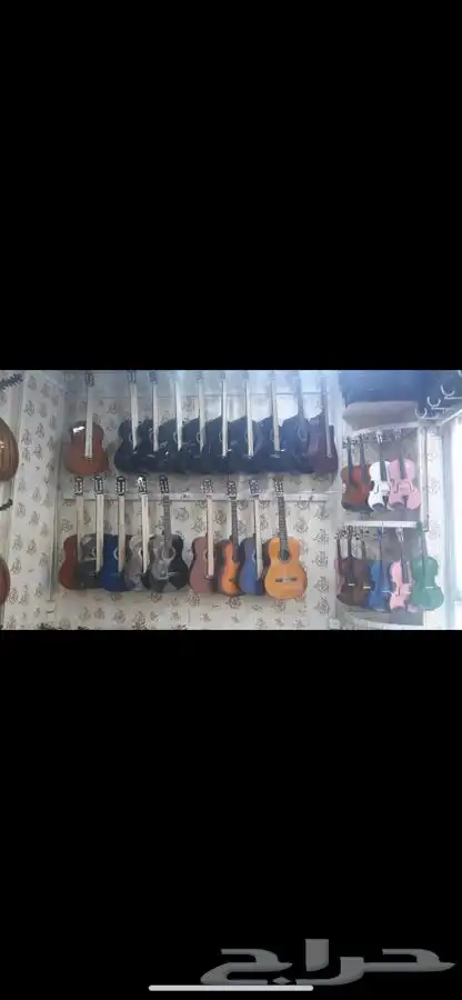 الالات موسيقيه غيتار وعود  بيانو وكمان  14