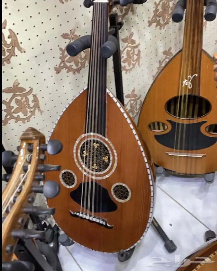 الالات موسيقيه غيتار وعود  بيانو وكمان  4