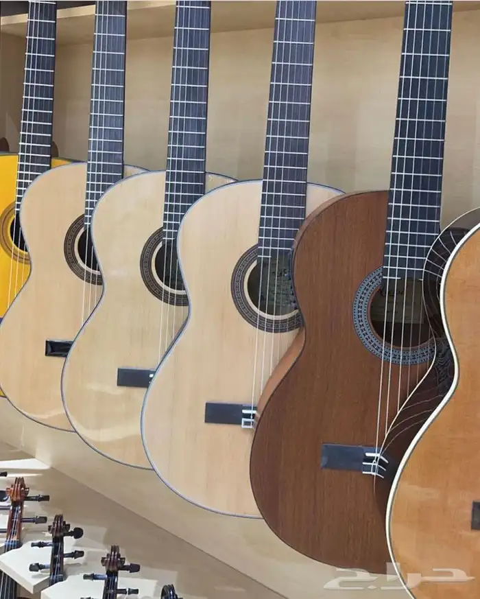 الالات موسيقيه غيتار وعود  بيانو وكمان  7