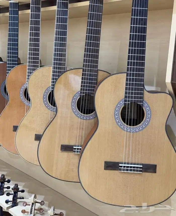 الالات موسيقيه غيتار وعود  بيانو وكمان  9