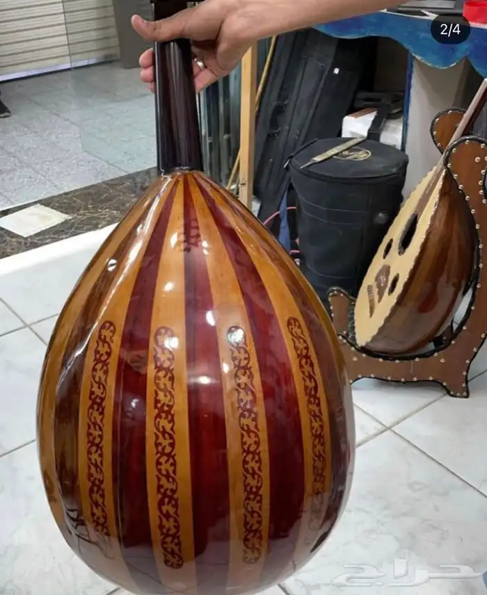 الالات موسيقيه غيتار وعود  بيانو وكمان  0